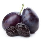 Two prunes with two plums behind it.