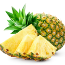 A pineapple with multiple pieces of pineapple next to it.
